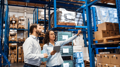 man and woman in the warehouse